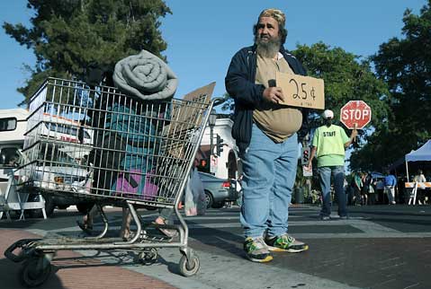 http://img70.xooimage.com/files/5/8/8/panhandling-david-homless-306f418.jpg